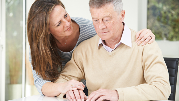 Confused Senior Man With Adult Daughter At Home