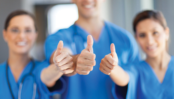 15692947 - group of healthcare workers thumbs up