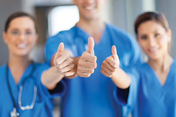 15692947 - group of healthcare workers thumbs up